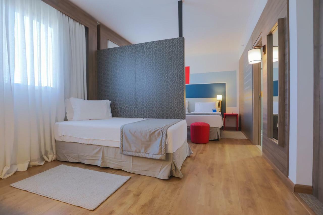Hotel Tryp By Wyndham Ribeirão Preto Zewnętrze zdjęcie A room at the hotel